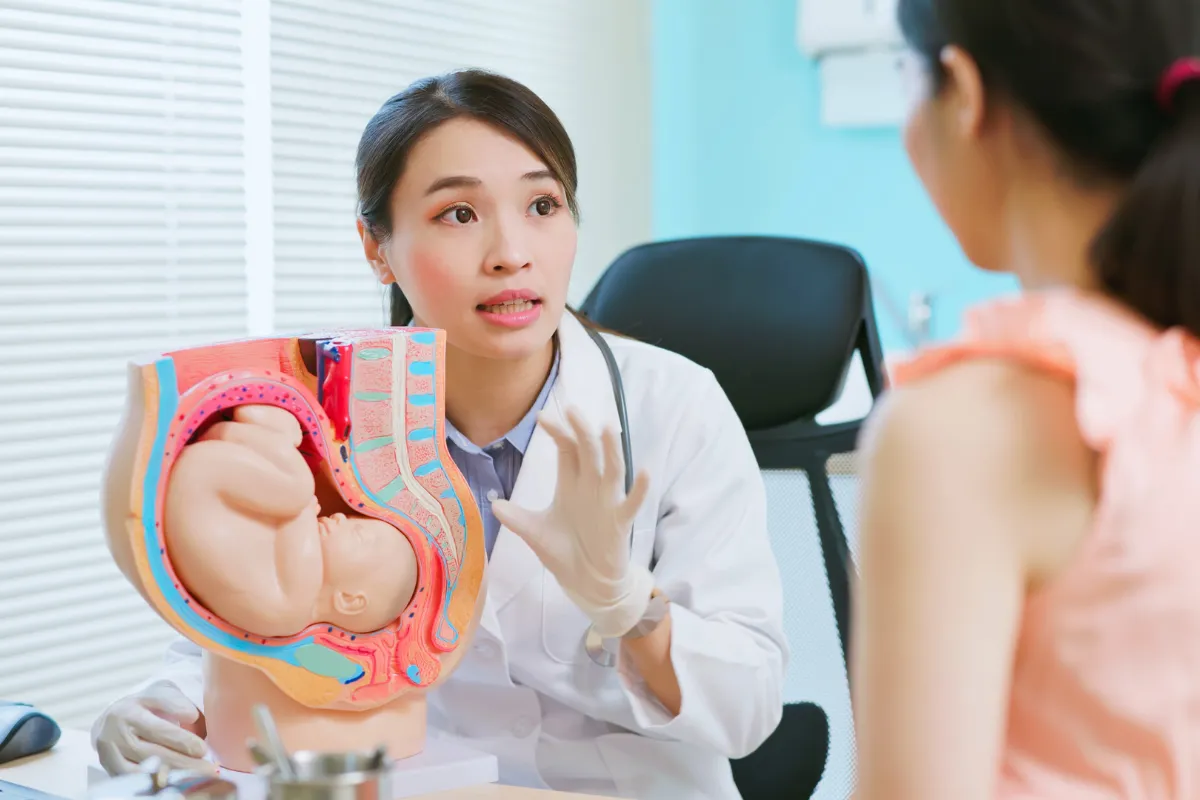 Doctor talking to a woman patient