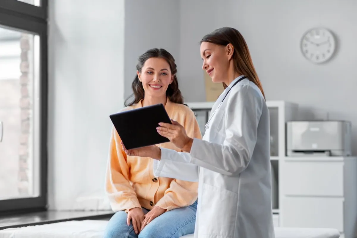 Doctor comforting patient