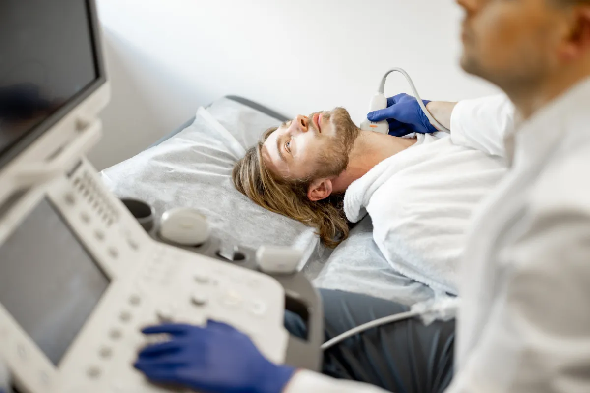 Doctor looking at test results with a concerned expression