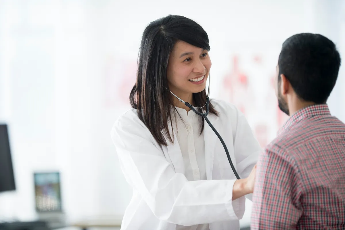 Wellness Visits: Prioritizing Your Health In The 77379 Community 2 Doctor Checking Blood Pressure