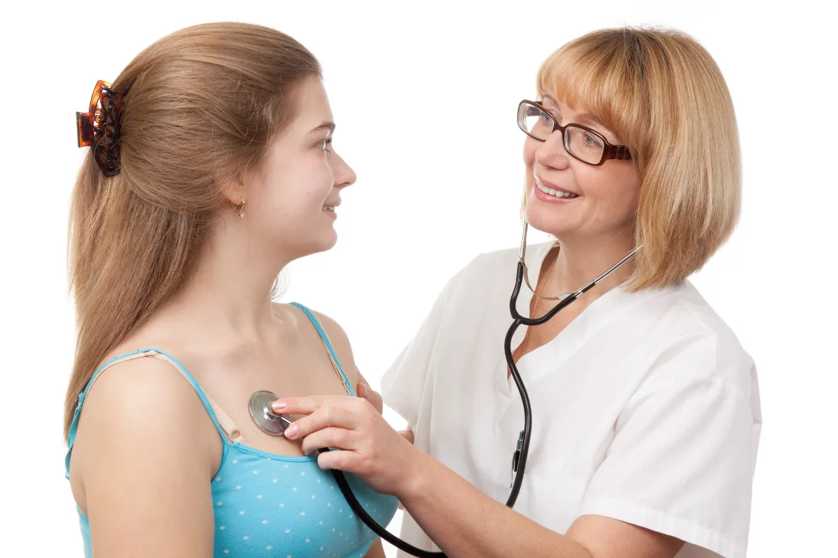 The Importance Of Annual Physicals For Seniors In Spring, Tx 1 Senior Woman Talking To Her Doctor During A Check-Up