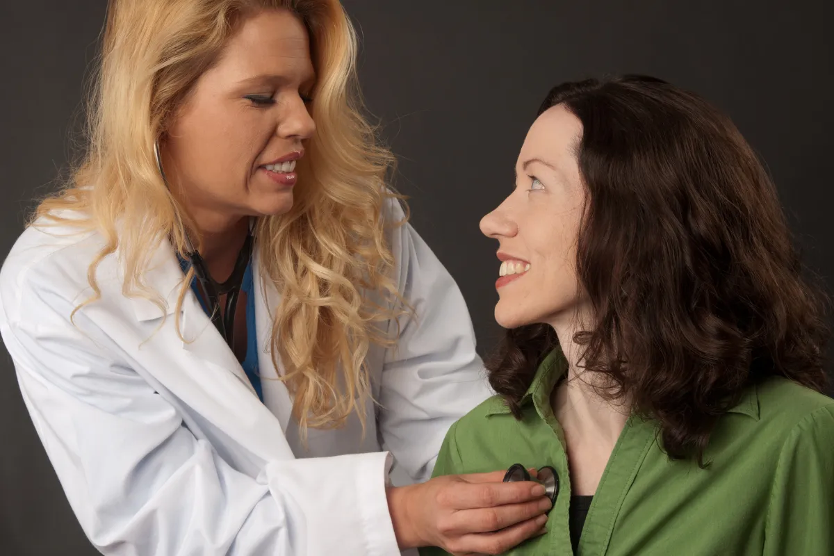 The Importance Of Annual Physicals For Seniors In Spring, Tx 2 Doctor Listening To Senior Patient'S Heartbeat With A Stethoscope