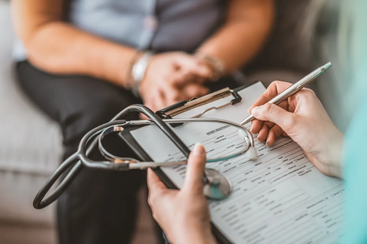 Women'S Health Exams: What To Expect In The 77379 Area 2 Doctor Reviewing Mammogram Results