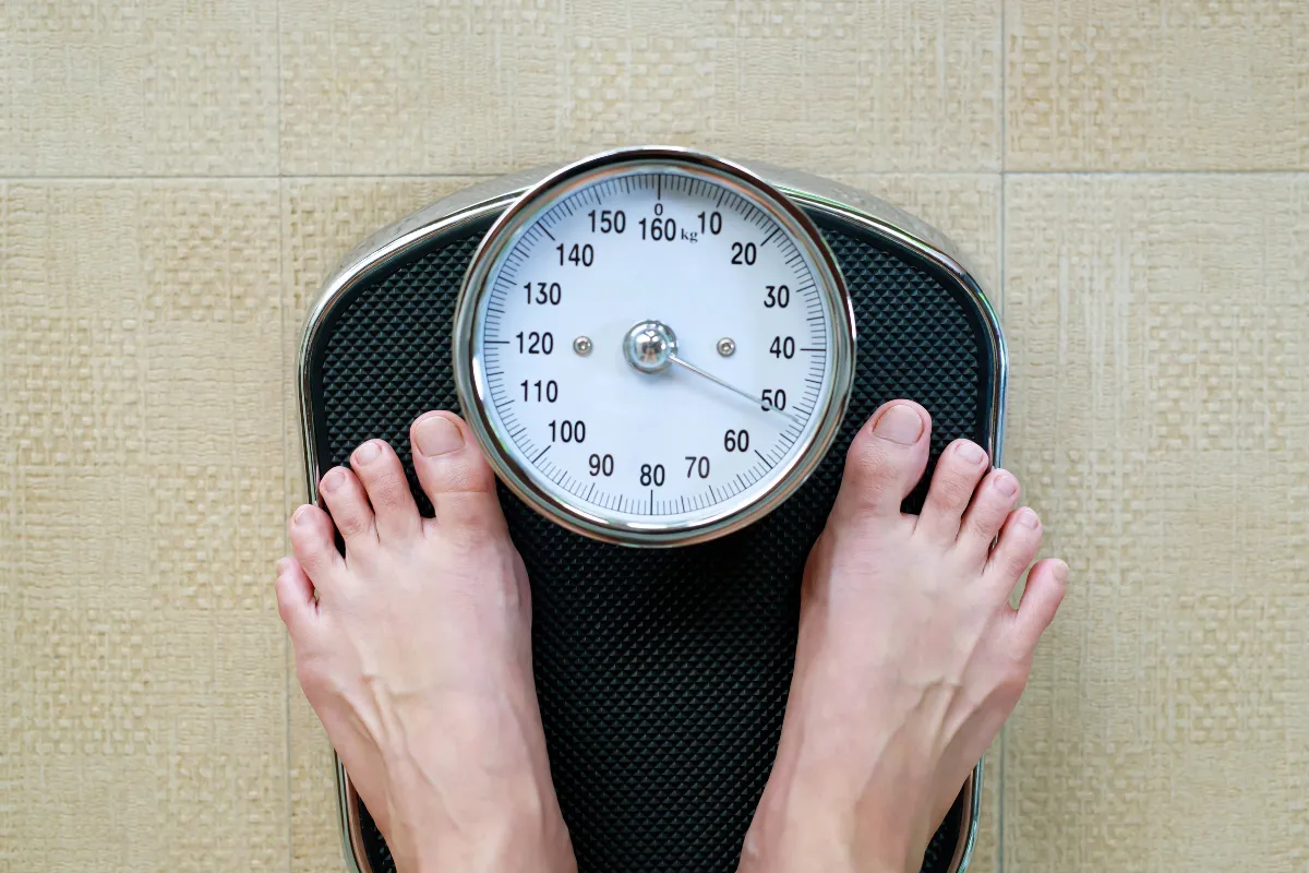 Weight Management: Achieving Your Goals In Spring, Tx 2 A Diverse Group Of People Exercising Together Indoors, Emphasizing Community And Support.