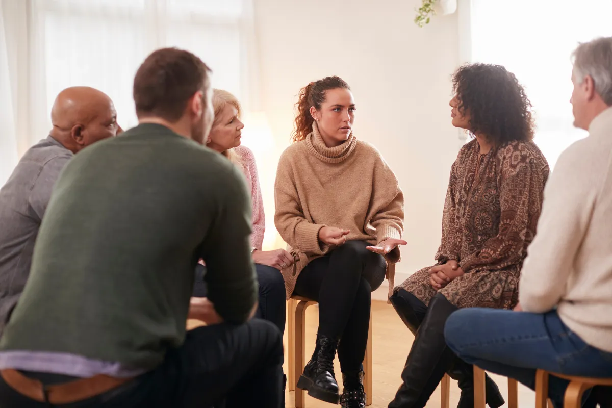 Mental Health Support: Finding The Right Care In The Spring Area 2 A Group Of Diverse People Sitting In A Circle, Suggesting A Support Group Setting