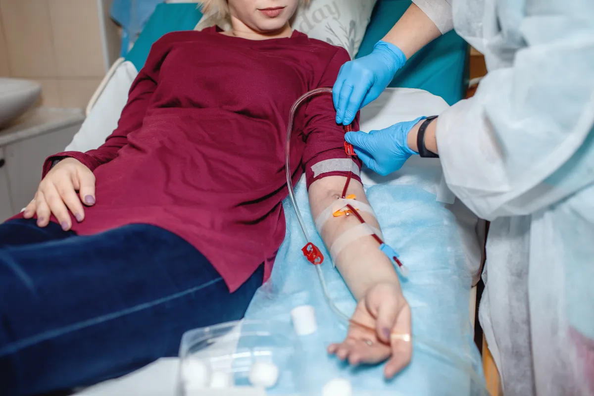 Doctor Consulting With Patient About Chronic Disease Management